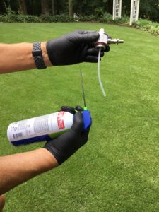Can of Air with Straw used to clear Power Injector