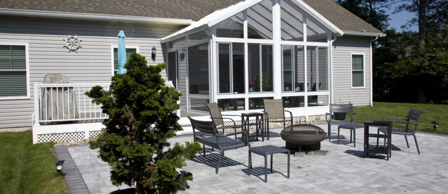 Home with deck too low, pavers and home siding ideal for springtails